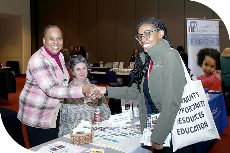 Attendees shaking hands