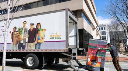 Tom Leporati of the Food Bank of Western Massachusetts loading a pallet of food.